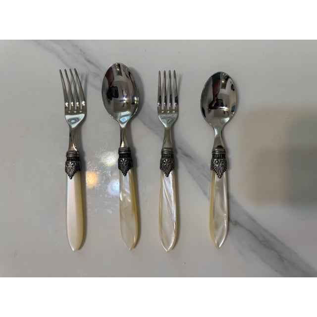 Mid 20th Century Stainless Steel Eme Inox Napoleon Flatware Set, Made in Italy From 18/10 Pearlized Acrylic Handler/Pearl Ivory Set for 8- 17 Pieces For Sale In Los Angeles - Image 6 of 12