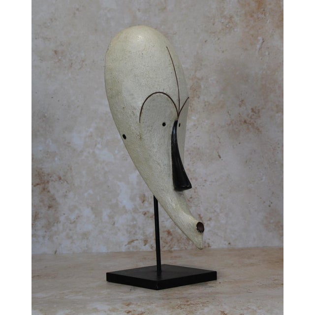 Well known for their reliquary figures the Fang also danced finely sculpted masks during a number of ritual activities....