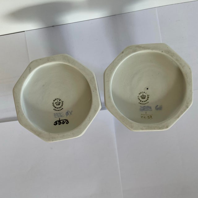 A pair of vintage blue fluted candle sticks by Royal Copenhagen. The candle sticks are in the Musselmalet Riflet pattern....