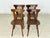 Four beautiful vintage wooden chairs in a classic country style. The chairs are very sturdy, having been built to robust,...