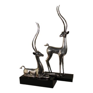 Late 20th Century Silver Plated Deer With Tall Antlers on Glossy Black Bases - Set of 2 For Sale