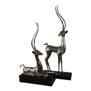 Late 20th Century Silver Plated Deer With Tall Antlers on Glossy Black Bases - Set of 2