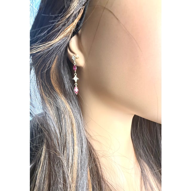 Introducing our exquisite 14K Yellow Gold Drop Earrings, a harmonious blend of classic elegance and contemporary design....