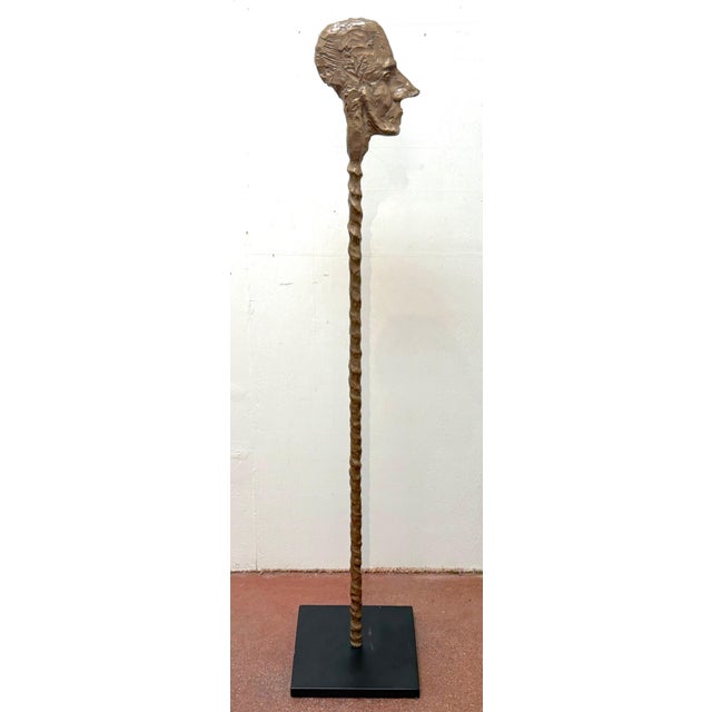 Giacometti School Bronze Figural Staff Sculpture on Iron Base Late 20th Century, 2 pieces Sculpture and Base A striking...