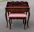 This vintage solid mahogany secretary desk with a matching stool offers a masterclass in small-space luxury and timeless...