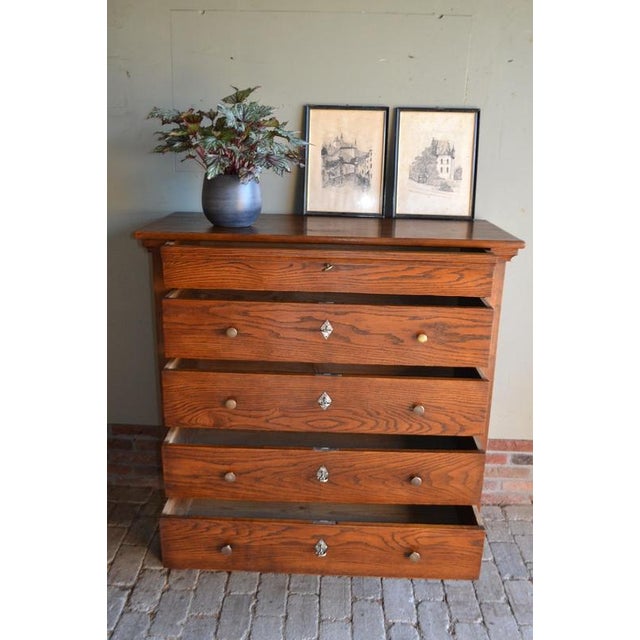 19th-century Dutch oak and pine chest of drawers, sideboard, commode. The height is 120 cm. The width is 114 cm. The depth...
