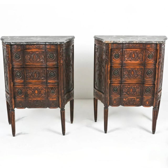 With beautiful low relief carving throughout, these elegant North Italian style three drawer commodes each have fine...