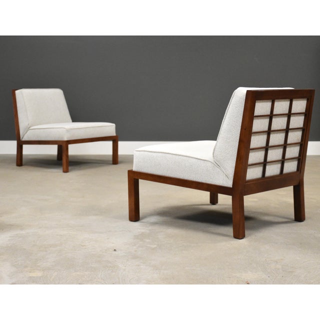 A pair of mid century modern solid maple slipper lounge chairs designed by Michael Taylor for Baker. New white oyster...