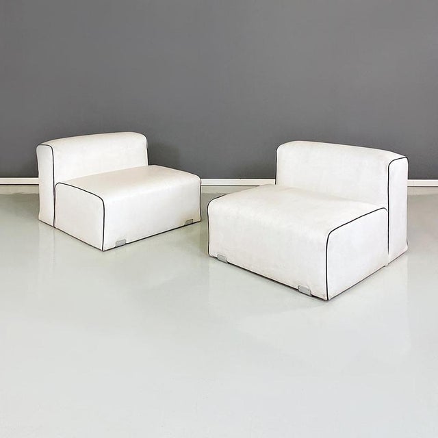 Italian modern pair of white leather and satin steel armchairs by Kazuhide Takahama for Gavina, 1970s. Pair of armchairs...