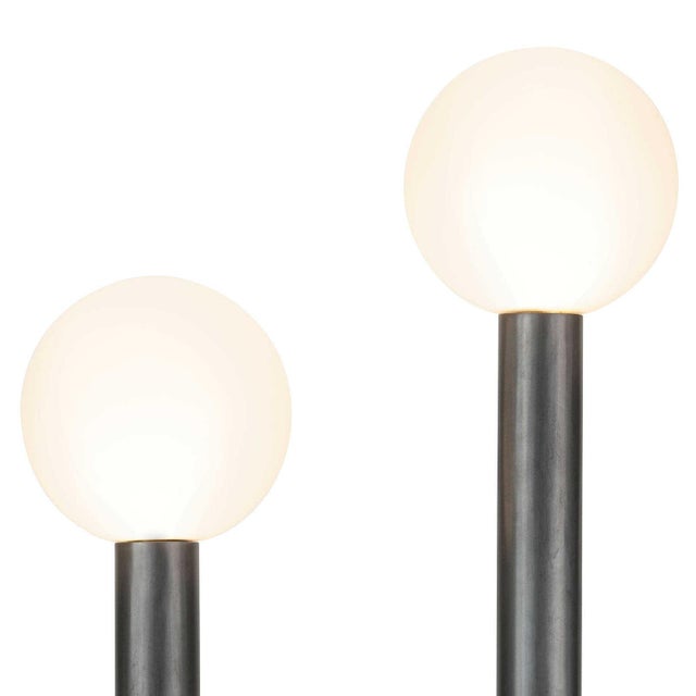 The Happy Table Lamp is a unique mix of modern and playful. Happy's simple, asymmetrical charm creates uplifting...