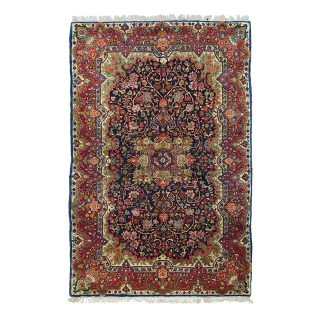 Fine Semi Vintage Sarouk Persian Rug, Hand Knotted, Cira 1930s Design: Floral One of Piar A Sarouk rug is a type of...