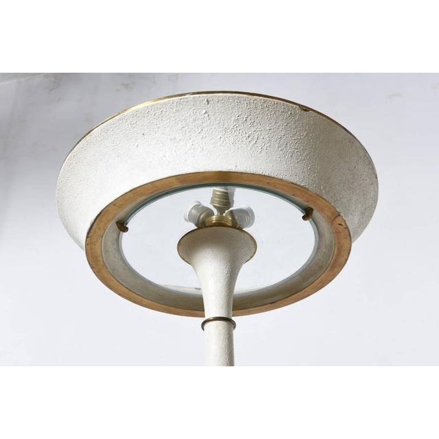 Fine French Art Deco ivory lacquered metal lamp with a glass insert on the shade, 1930s. Original condition, ivory and...