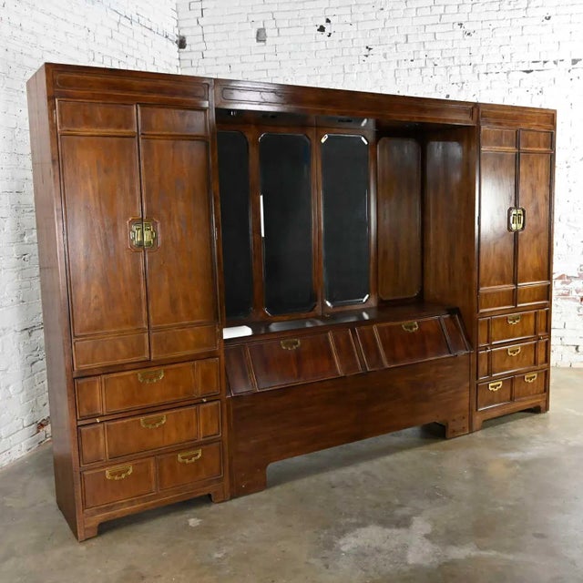 Wonderful campaign style modular wall unit bedroom or bed set up with side armoires comprised of dark wood, removeable...