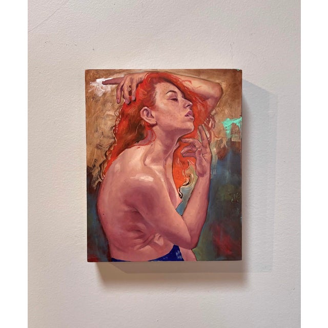 The artwork depicts a striking figure of a woman with flowing red hair, her posture exuding a sense of confidence and...