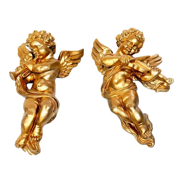Mid Century Baroque Style Italian Gold Cherub Wall Plaques – Musical Putti Playing Trumpet and Violin – A Pair For Sale