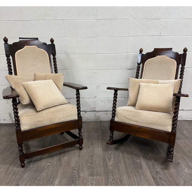 This is a gorgeous pair of vintage, possibly antique, Jacobean Revival or Tudor style barley twist oak seating pieces...