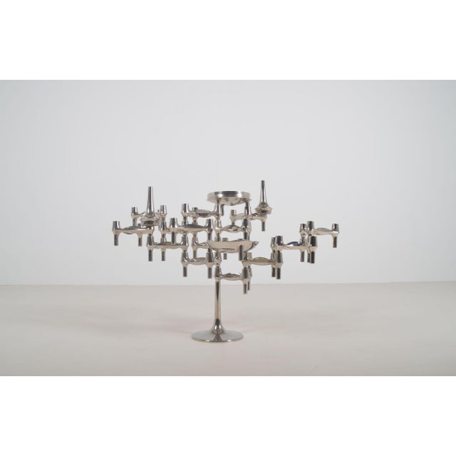 A pair of footed candlesticks designed in the 1960s by Fritz Nagel in collaboration with the architect/artist Werner...