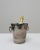 A 20th Century French silver-plated champagne bucket featuring a sleek, tapered silhouette and refined decorative banding....
