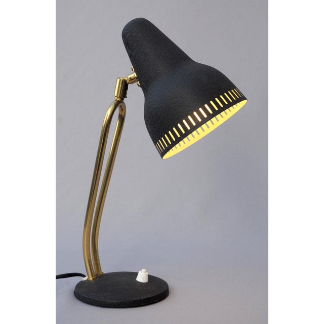 Wall / Table lamp Model 6150 designed and manufactured by Falkenbergs Belysning. A conical shade with vertical...