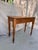 This attractive and timeless English pine side table has a rectangular shape, raised on four turned legs, and has 1 lovely...