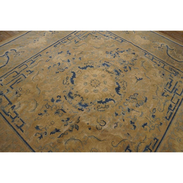 Antique Chinese - Peking Chinese Medallion Ivory 1880s Square Rug, Circa Date: 1880s. This exceptional example of a late...