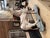 An antique wooden horse crafted in the style of carousel horses. It has retained its beautiful patina, and its base is...