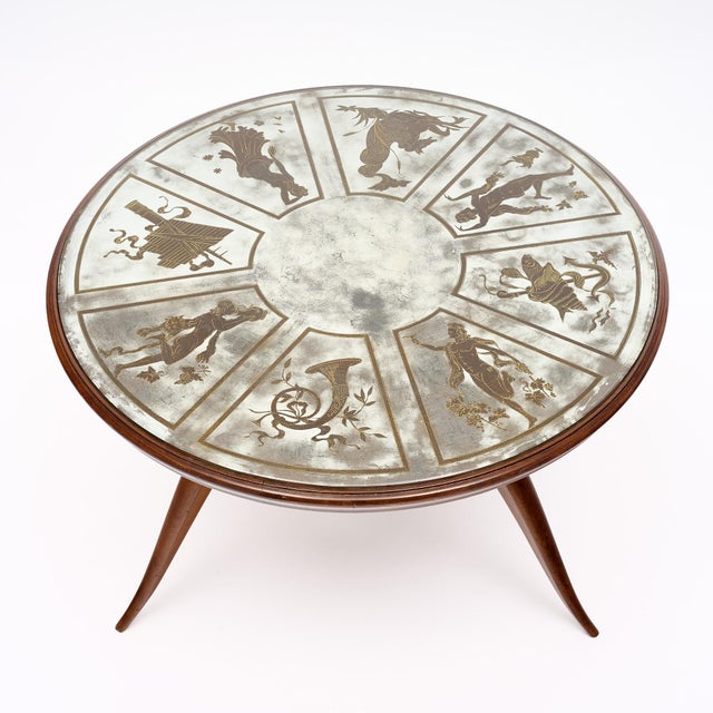 Side table from Art Deco France. This piece is made of solid wood construction and has been finished with a lustrous...