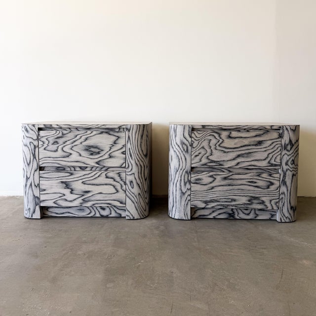 Pair of vintage 1980s Italian Postmodern nightstands featuring striking geometric forms and a sophisticated grey graphic...