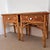 A pair of ornate wicker Bedside tables with drawer with a white ceramic handle Top is wicker with the sides and front...