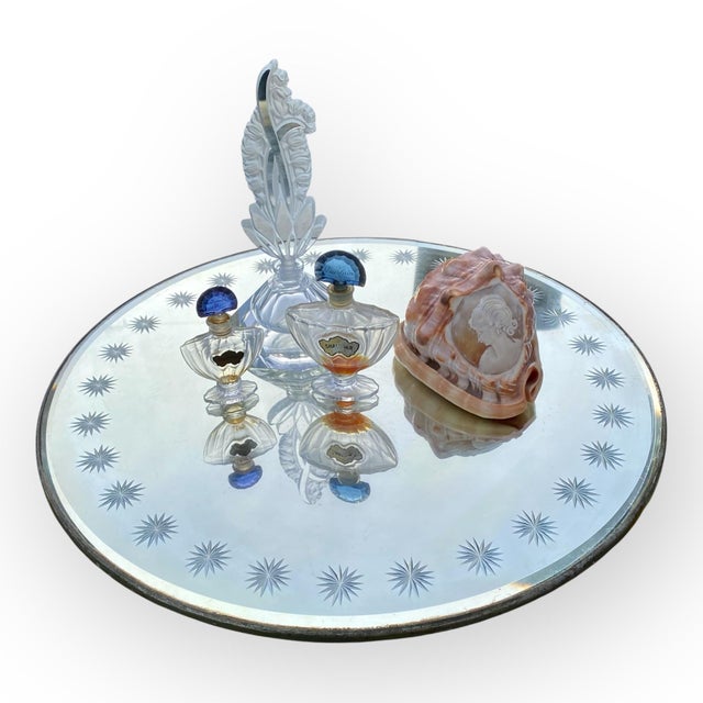 Vintage late 1940’s Beveled and Cut Round Mirror with 28 hand etched stars. Use as a Vanity tray or display tray. These...