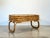 70s rocking bench, bamboo structure, removable seat reupholstered with a new fabric, the lines recall some productions of...