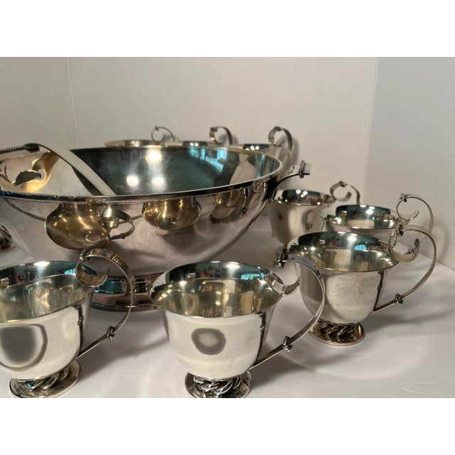 American Royal Hickman Ingrid Punch Bowl set from the early 1950’s. Bowl with ladle and twelve (12) cups. Modernist design...
