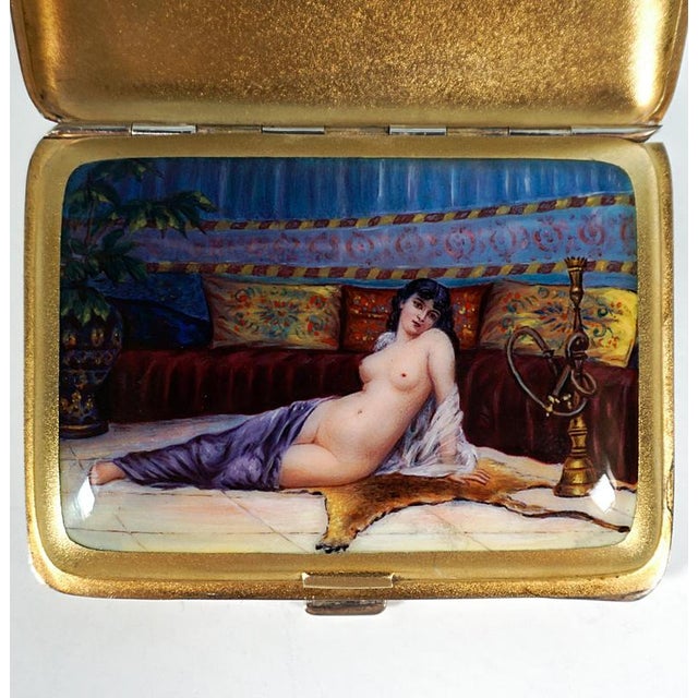 Exquisite rectangular silver cigarette case with a smooth finish and a double lid: Beneath the simple, smooth lid lies a...
