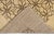 Beautiful modern Deco-style hand-knotted wool rug with a beige field. This Contemporary rug has accents of brown in a...