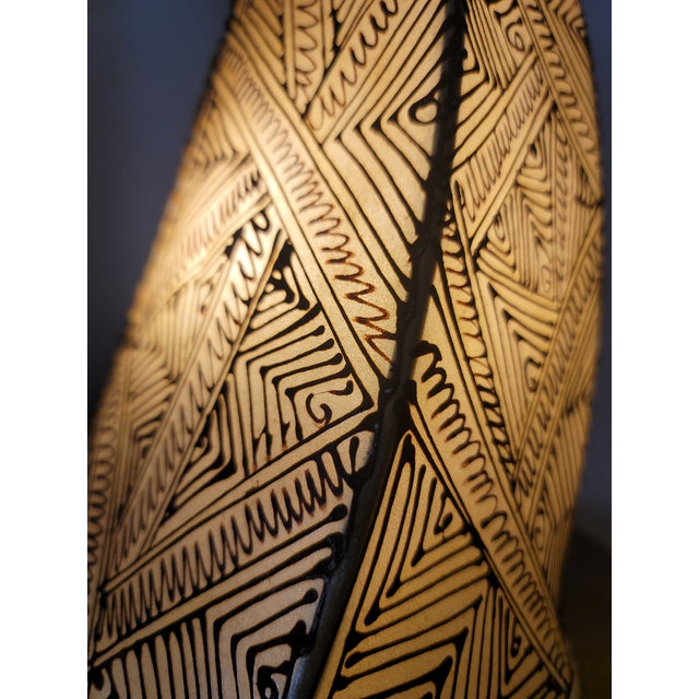 A radiant piece of Moroccan artistry, this handmade henna lamp brings the warmth of the Maghreb into any space. Crafted by...