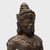 Sculpted in the manner of Khmer statuary, this cast bronze devotional figure depicts a standing Buddhist deity, most...