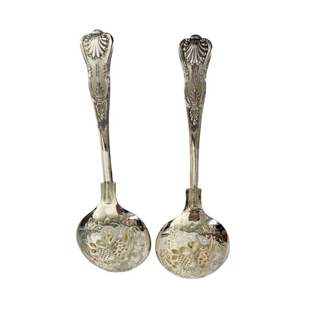 Superb vintage pair of Sheffield Silver plate large spoons, each measuring 9" H × 2.75" W × 1" D. These statement pieces...