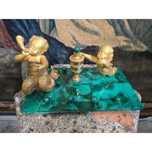 An exceptional and highly decorative Italian malachite and gilt bronze (ormolu) inkwell dating from the late 19th century,...