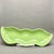 This charming mid-century modern serving dish is masterfully crafted in the shape of a large green bean, featuring a...