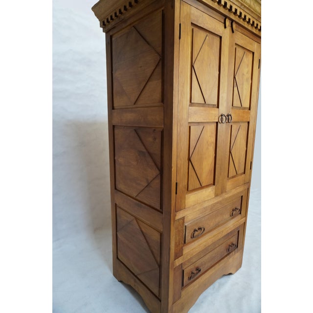 Wooden armoire made in Mexico Two large lower drawers and two small concealed drawers behind the doors. High interior...