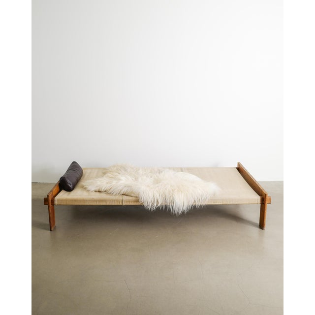 Rare danish mid century modern architectural daybed in stained oak, beige canvas with a black leather cushion and white...