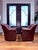 English Pair of Vintage Hancock & Moore Burgundy Leather Swivel Lounge Chairs With Matching Ottomans, 1988 For Sale - Image 3 of 18