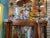 Wood Antique Curved Glass Mirrored Back Curio Cabinet on Claw Feet For Sale - Image 7 of 12