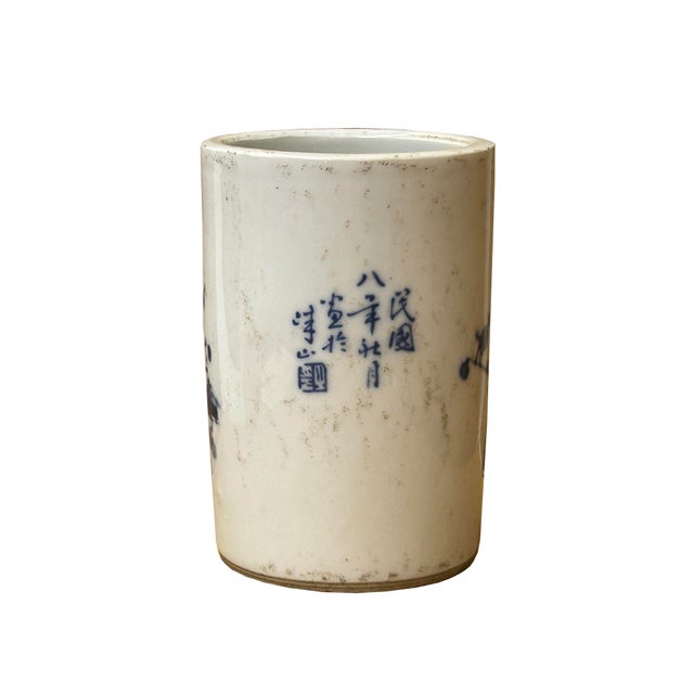 This vintage style Chinese blue and white porcelain brush pot (Bitong) showcases the refined artistry of the Republic...
