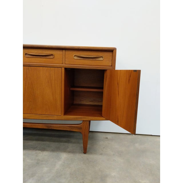 Authentic vintage mid century modern teak credenza / sideboard / console. "Fresco" series designed by Victor B Wilkins for...