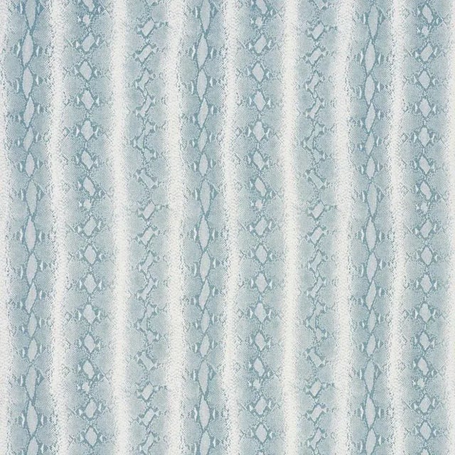 An exquisite Linen printed with a delicate, snake-like pattern, this fabric is the perfect expression of luxury with a...