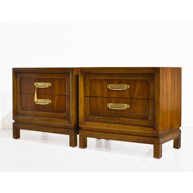 A beautifully matched pair, these 1970s Campaign style nightstands by Henry M Goodman Furniture bring warmth, character,...