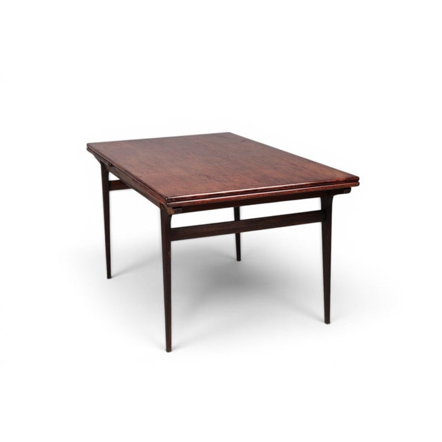 Mid-Century Modern 1950s Attributed to Johannes Andersen Jet Age Draw Leaf Dining Table in Rosewood For Sale - Image 3 of 8