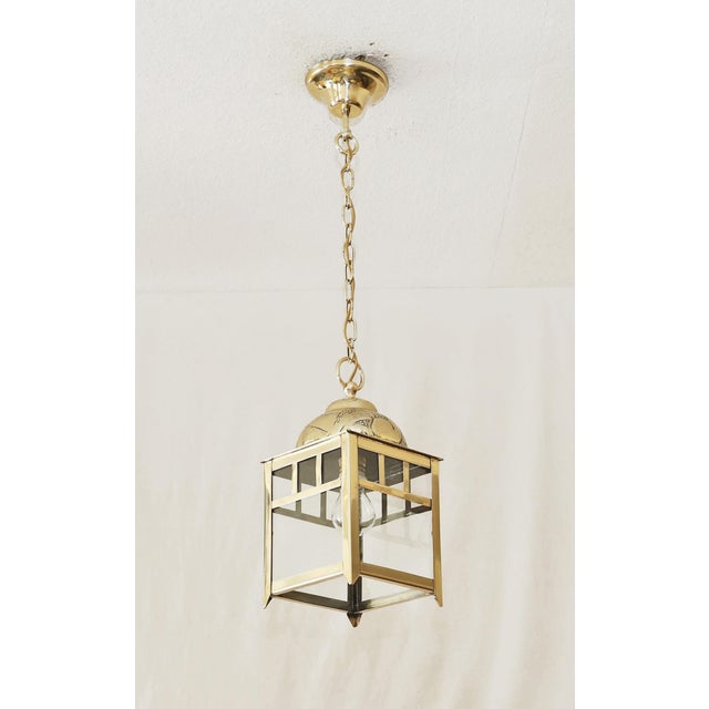 Art Nouveau Pendant Lamp Art Nouveau pendant lamp made around 1915. Square, glazed body. Flower-patterned dome. Suspended...