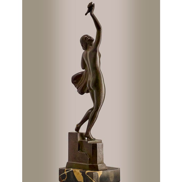 Pierre Le Faguays, Nude Woman with a Dove, 1930, Bronze & Marble, in Good conditions. Designed 1920 to 1949 This piece has...